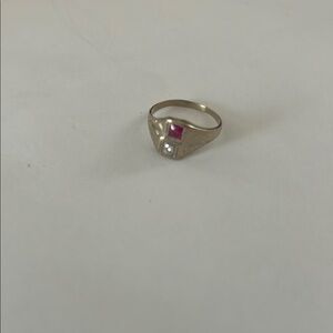 Elegant 14 kt white gold diamond and and garnet pinky ring